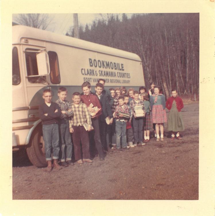Photo of children from Yale School standing in front of a FVRLibraries bookmobile, circa 1960