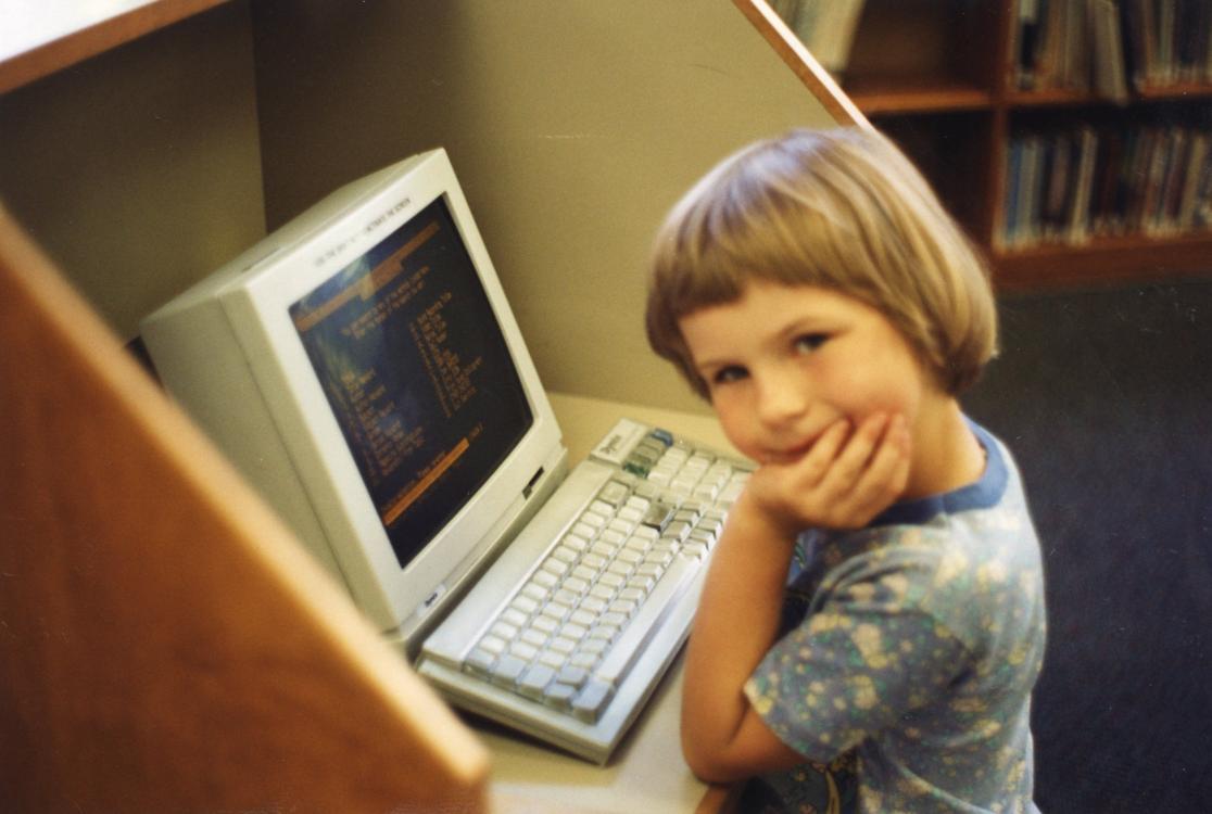 Photo of a child at a computer at Vancouver Community Library, when it was on Mill Plain, circa 1980s